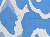 an image of a close up of a blue and white patterned fabric
