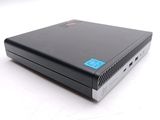 the back of a black laptop computer sitting on top of a white surface