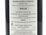 a close up of a bottle of wine on a white background