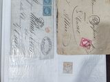 a picture of an open book with stamps on it