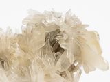 a small cluster of crystals on a white surface