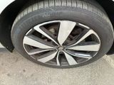 a close up of a tire on a car ' s rim