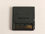a close up of a micro sdr card sitting on top of a white surface