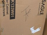 a box that is sitting on the ground next to a pile of boxes