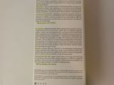 the back of a box of a toothbrush sitting on top of a white table
