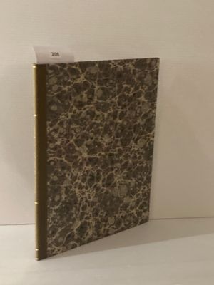 un livre posé sur une table blanche
