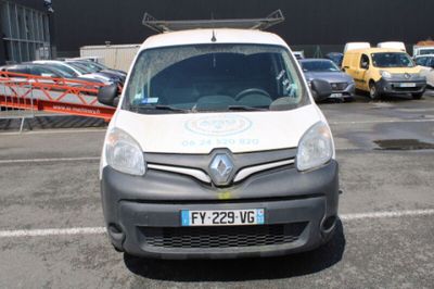 a white van that is parked in a parking lot