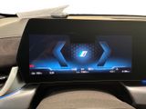 the dashboard of a car with a digital display in the center
