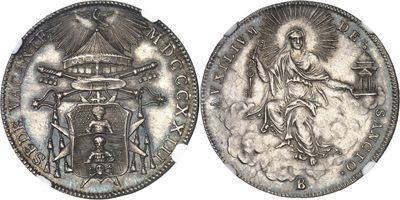 a close up of a silver coin with an image of a woman on it