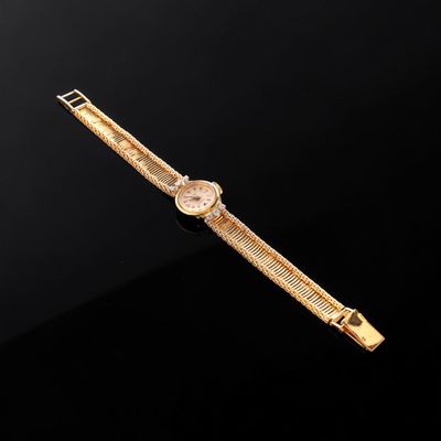 an 18k gold ladies ' s wrist watch
