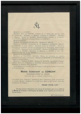 un vieux document en noir et blanc sur lequel figure une croix