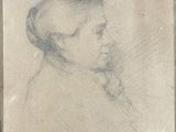 an old drawing of a woman in profile with her head turned to the side