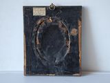 a picture of an old book with a ring on it