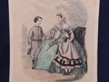 an old picture of a woman in a blue dress and a man in a white suit