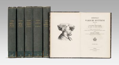 a set of four books with illustrations of men in hats