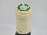 a bottle of wine that is sitting on a table