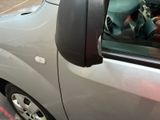 a car that is parked on the side of the street