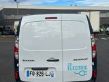 a white van that is parked in a parking lot