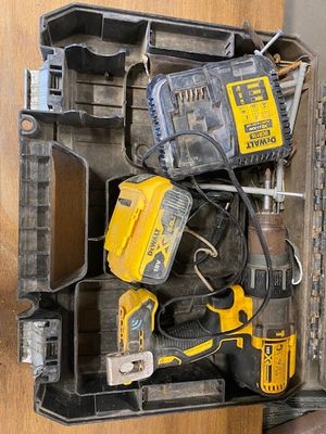 an overhead view of a tool box filled with tools on top of a wooden table