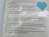packaging of a pair of black skinny jeans on a white table