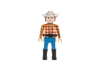 figurine représentant un homme portant un chapeau de cow-boy et un pantalon bleu
