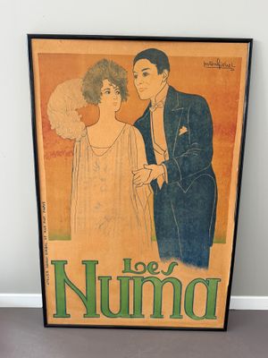 vintage poster of a man and a woman standing next to each other in front of a white wall