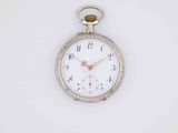 a silver pocket watch on a white surface with a white background