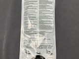 a plastic bag with a button on it on a table