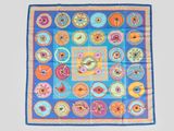 an image of a blue and orange square scarf
