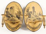 pair of antique painted wall sconces with figures on them