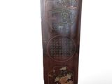 an image of a tall wooden cabinet with a dragon design on it