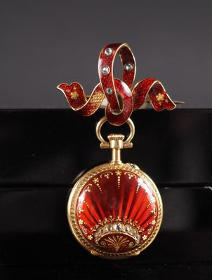 an image of a red and gold locke with a ribbon around it