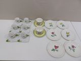 a lot of plates and cups on the table