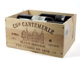 a wooden box with two bottles of wine in it