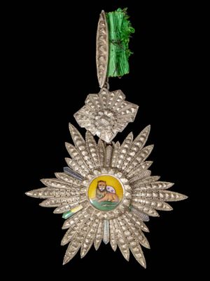 une image représentant une médaille d'argent sur laquelle figure le portrait d'une femme