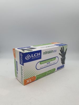 une photo représentant une boîte de gants jetables posée sur une surface blanche