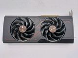 a close up of a video card with two fans on top of it