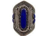 a close up of a ring with a blue stone in it