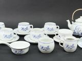 a picture of a collection of blue and white tea and coffee sets