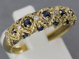 une image représentant une bague en or sertie de saphirs et de diamants