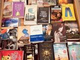 a box full of books sitting on the floor