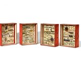three wooden boxes with different types of flies in them