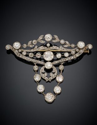 une broche en diamant et en or