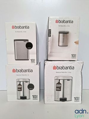 three boxes of brabantia coffee machines sitting on a table
