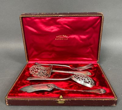 an image of a set of silverware in a red case