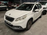 a white car that is parked in a garage