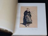 an open book with a drawing of a woman in a black dress
