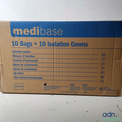 boxes of medical supplies are sitting on a table in a room