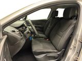 the interior of a car with the door open showing the front seats
