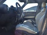 a picture of a car with a steering wheel and a seat